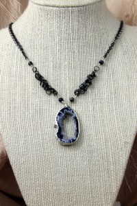 Geode pendant on silver necklace