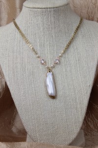 Mabe pearl pendant on gold necklace