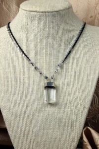 Quartz pendant on silver necklace