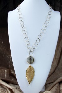 Sparkly quartz and gold leaf pendant on long chain